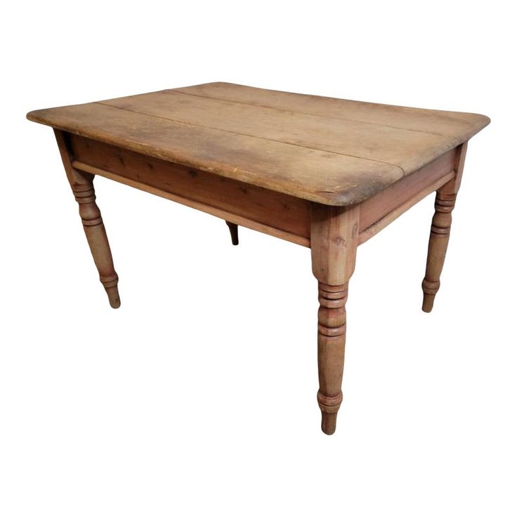 an old wooden table with two legs and a small drawer on the top, isolated against a white background