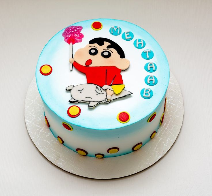 a birthday cake with a cartoon character on it