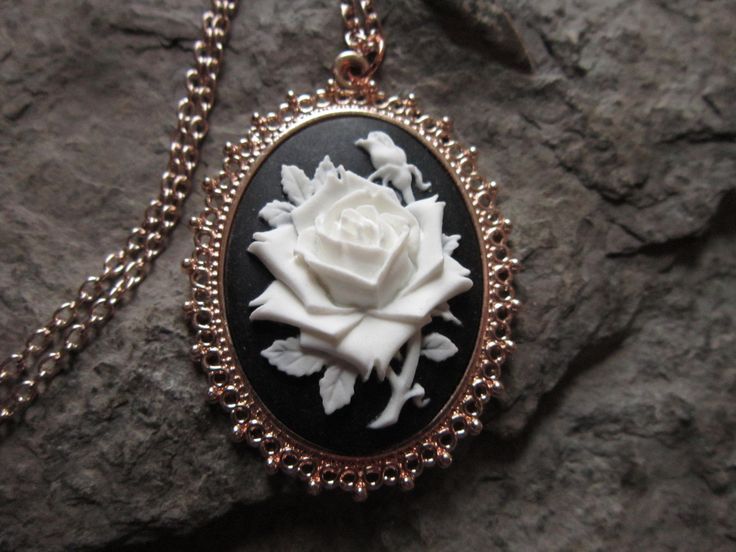 "Beautiful rose cameo necklaces The cameos are gorgeous. I do have other colors and styles, so please do browse, I can make any cameo in my shop into this pretty necklace, so browse and message me with a custom order. The pretty setting is about 2 1/4\" long. The chain is a matching 24\" rose gold link chain with a lobster claw clasp, if you would prefer a different length, please leave a message at checkout. Perfect for Brides or Bridal parties. Makes a unique memorable gift for any occasion. T