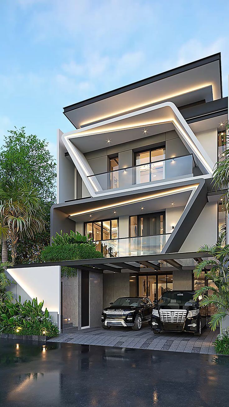 two cars are parked in front of a modern house with large windows and balconies