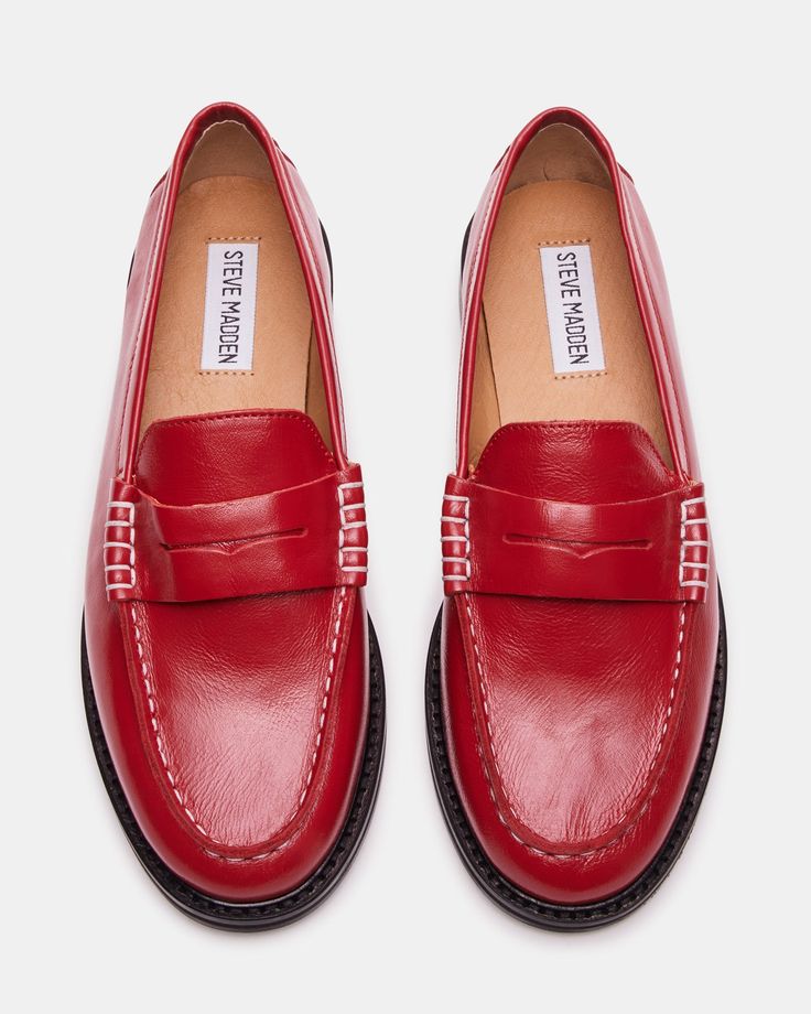 Upgrade your shoe game with the MADISON loafer. Crafted with luxurious leather, this stylish shoe adds a touch of sophistication to any outfit. Step into comfort and class with every step. 1 inch heel height Leather upper material Leather lining Leather sock Synthetic sole Imported Classic Slip-on Loafers With Red Sole, Classic Loafers With Red Sole For Office, Classic Red Leather Shoes With Flat Heel, Classic Loafers With Red Sole For Work, Classic Red Leather Slip-ons, Classic Red Round Toe Loafers, Classic Red Slip-on Loafers, Classic Red Loafers With Round Toe, Loafers With Red Sole And Flat Heel For Work