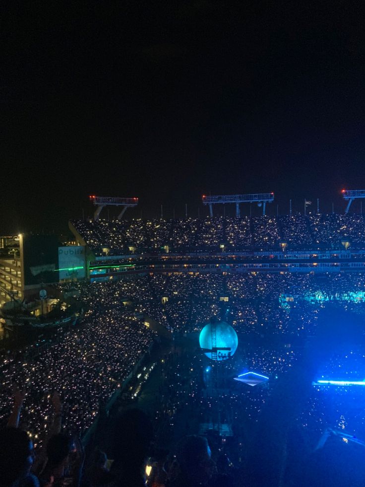 an aerial view of a stadium at night