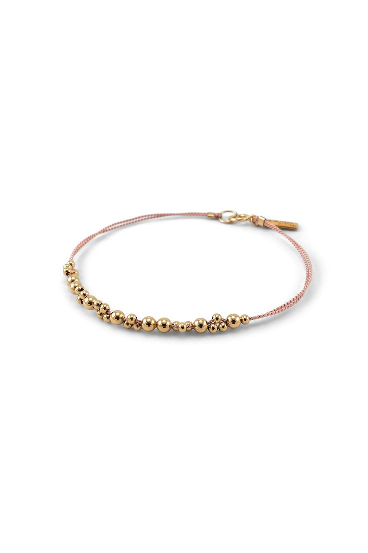 Our Leo Major Bracelet is a two-stranded silk cord adorned with an extended segment of detailed gold beadwork. 14k gold-filled beads and findings, silk cord. Complimentary gift packaging - handmade jewelry by Abacus Row in San Francisco California USA - bipoc Silk Cord Bracelet, Christmas Gift Sale, Beads Bracelet Design, Silk Cord, Cord Bracelet, Cord Bracelets, California Usa, Gold Beads, Bracelet Designs