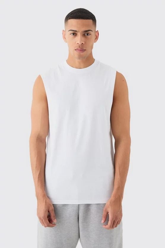 Basic Drop Armhole Tank | boohooMAN USA Sleeveless Muscle Tee For Summer Sports, Sleeveless Sports Top For Summer, Cotton Sleeveless Muscle Tee For Summer, Summer Muscle Tee For Gym, Cotton Sleeveless Sports Vest, Cotton Top For Gym In Summer, Cotton Gym Top For Summer, Summer Cotton Gym Top, Summer Gym Cotton Top