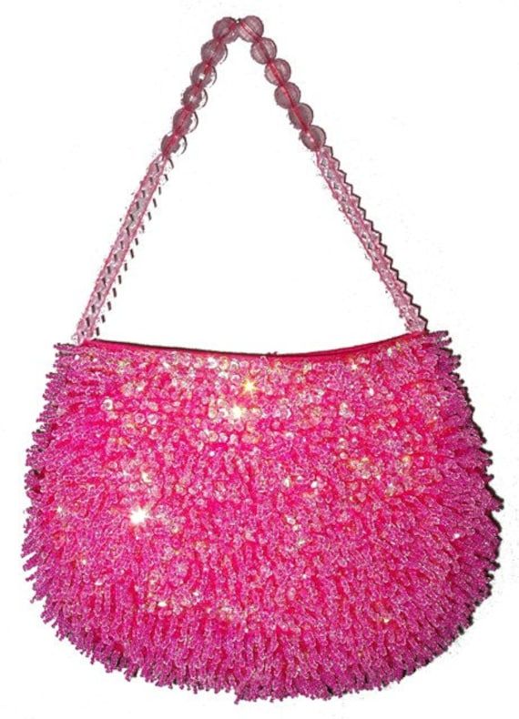 This cool purse is fully Sequin beaded ( Front & Back ) , Shaped & has a sequin beaded handle for carrying . Perfect for pairing up with your costume or to carry with you to the party! Handheld Sequined Evening Bag For Parties, Pink Sequin Evening Bag, Pink Embellished Evening Bag For Party, Pink Embellished Party Evening Bag, Pink Bags For Evening And Festivals, Summer Party Embellished Evening Bag, Pink Sequined Party Bags, Handheld Evening Bag For Parties And Festivals, Handheld Evening Bag For Party And Festivals