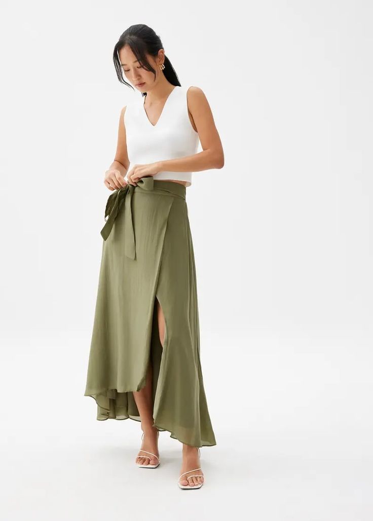 Tie Flare Maxi Skirt | Love, Bonito US Chic Beach Wrap Skirt With Lining, Chic Lined Wrap Skirt For Beach, Chic Tiered Wrap Skirt For Summer, Chic Midi Skirt For Vacation, Chic Vacation Midi Skirt, Chic Summer Wrap Skirt For Brunch, Chic Asymmetrical Beach Skirt, Chic Asymmetrical Skirt For Beach, Chic Pleated Skirt For Vacation