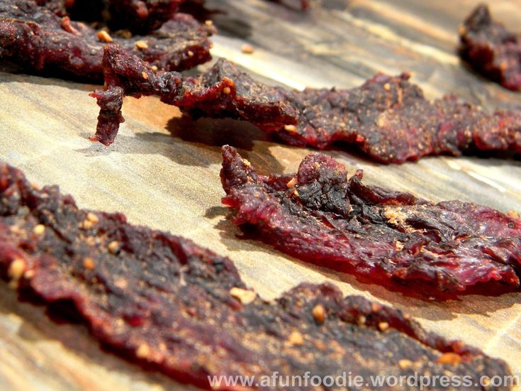 raw beef strips on a cutting board ready to be cooked