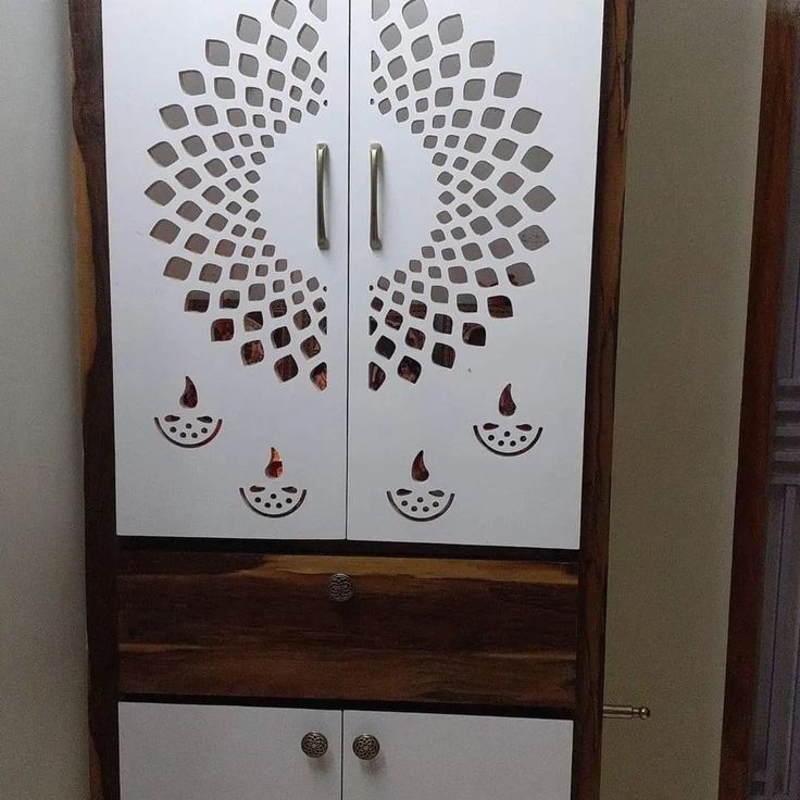 the cabinet is made out of wood and white