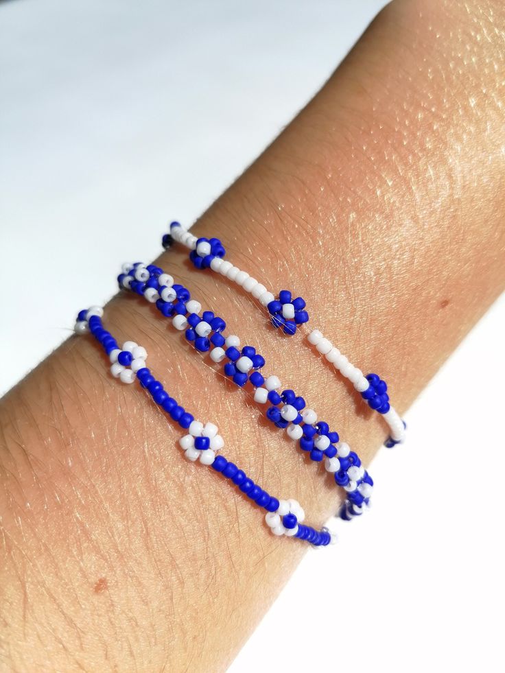 Hand made jewelery made of high quality Japanese glass beads, silon and elastic cord and steel clasp.  There are bracelets in 5 sizes:  - 14cm/ 5,5 inch  - 15,5cm/ 6,1 inch  - 17cm/ 6,7 inch  - 18,5cm/ 7,3 inch  - 20cm/ 7,9 inch Bracelet number 1 has a silon cord and steel clasp. Bracelets number 2 and 3 have an elastic cord. Blue Flower Beads For Gifts, Blue Flower-shaped Beads For Gifts, Trendy Blue Flower Bracelet, Blue Flower Beaded Bracelets For Summer, Beaded Braclets, Bracelet Crafts, Blue Skies, Number 2, Slovakia