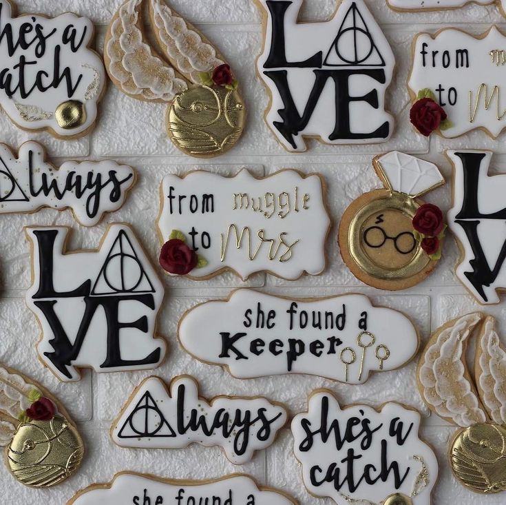 harry potter themed cookies are on display for the guests to eat at their wedding reception