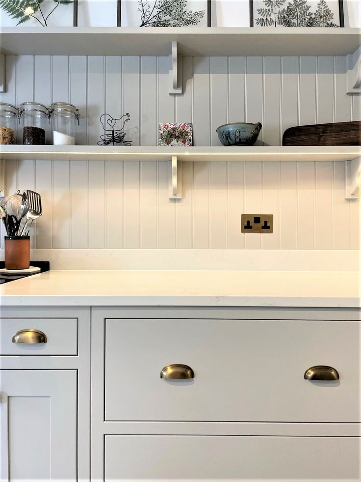 In frame shaker kitchen detail showing brass handles an open shelving with hidden lighting. Tongue And Groove Splashback, Tongue And Groove Shelves, Tongue And Groove Panelling Kitchen, Kitchen Tongue And Groove Panelling, Tongue And Groove Kitchen Walls, Tongue And Groove Kitchen Backsplash, Tongue And Groove Backsplash Kitchen, Kitchen Tongue And Groove, Tongue And Groove Kitchen