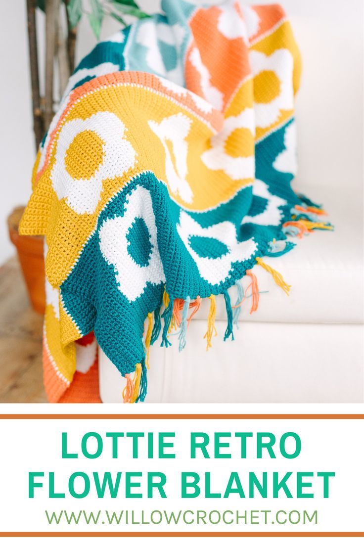 a white couch with a colorful blanket on it and text overlay that reads lottie retro flower blanket