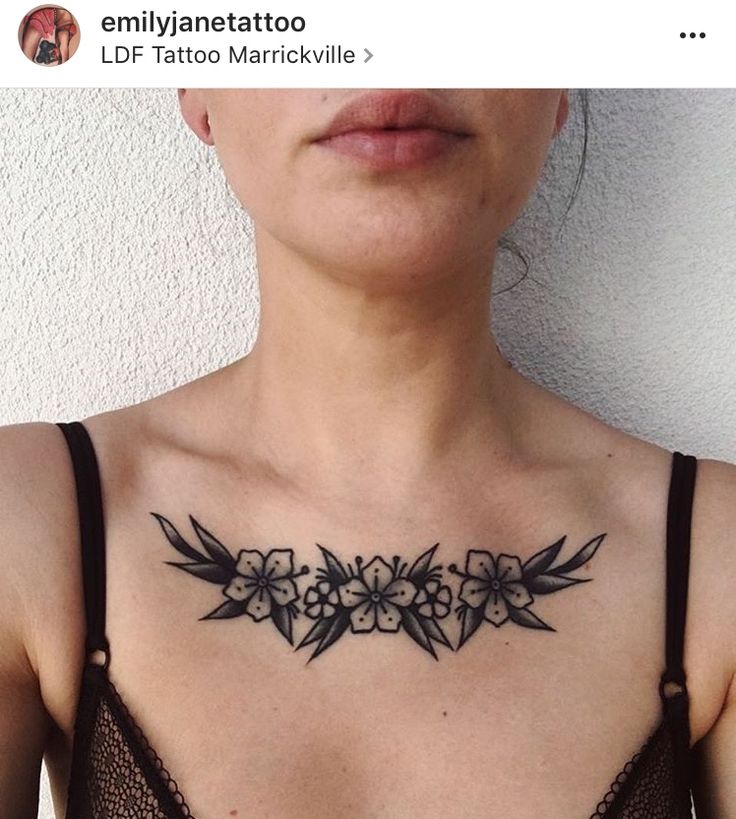 a woman with a tattoo on her chest