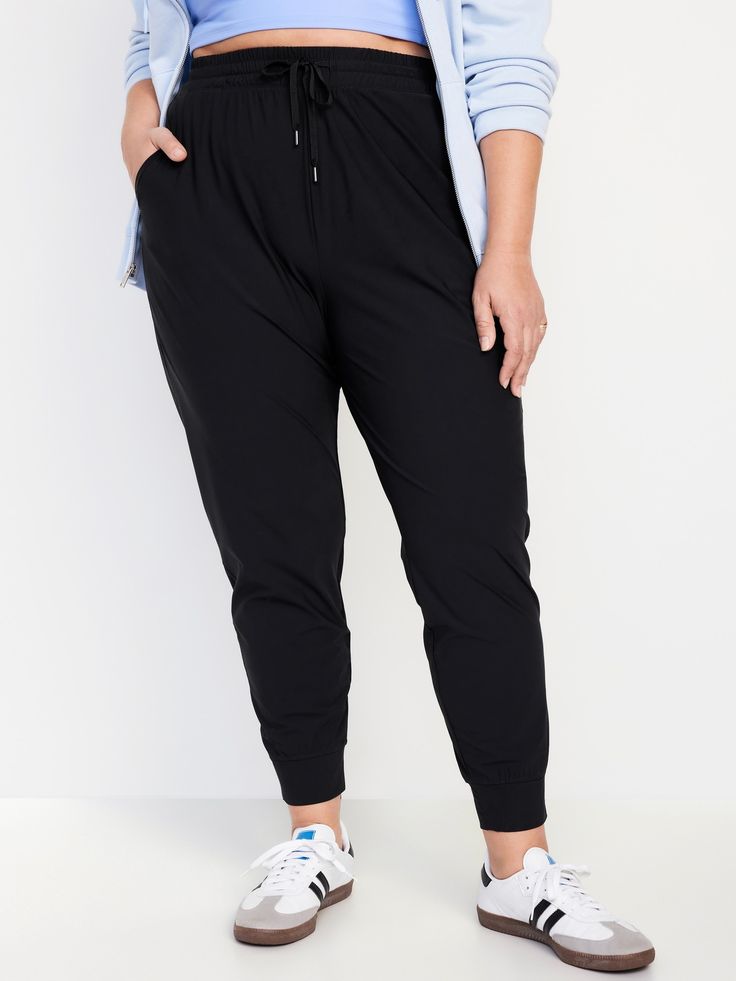 elastic-drawstring waist hip pockets banded cuffs go-dry wicks moisture breathable sits at belly button slim thigh and leg 27" regular inseam 25" petite inseam 30" tall inseam models are approx.  5'9" and wear sizes s (4), l (12), and xl (18)machine wash according to the care instruction label Relaxed Fit Straight Leg Activewear With Elastic Waistband, Functional Straight Leg Activewear With Elastic Waistband, Casual Joggers With Elastic Side Panels For Workout, Relaxed Fit Tapered Leg Joggers With Elastic Waistband, Sporty Joggers With Comfort Stretch And Tapered Leg, Relaxed Fit Joggers With Elastic Waistband And Tapered Leg, Relaxed Fit Straight Leg Activewear With Pockets, Athleisure Straight Leg Pants With Elastic Waistband, Athleisure Pants With Elastic Waistband Straight Leg