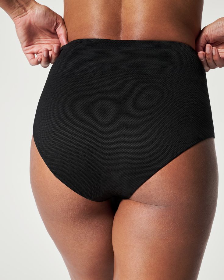 Designed with a beautiful textured fabric, this shaping high rise bottom was created to flatter every body. Featuring a unique design with flexible layers and no-dig leg openings, this style is equally as chic as it is sun and swim-friendly. | Spanx Women's SPANXshape Swim Pique Hi-Rise Cheeky Bottom Sculpting Nylon Bottoms, Modern Fitted High-cut Leg Bottoms, High Rise Seamless Bottoms, Modern Stretch High Waist Bottoms, Modern High Waist Stretch Bottoms, Modern High-waist Stretch Bottoms, High Waist Sculpting Bottoms With Seamless Construction, High-waist Sculpting Bottoms With Seamless Construction, High Waist Sculpting Seamless Bottoms