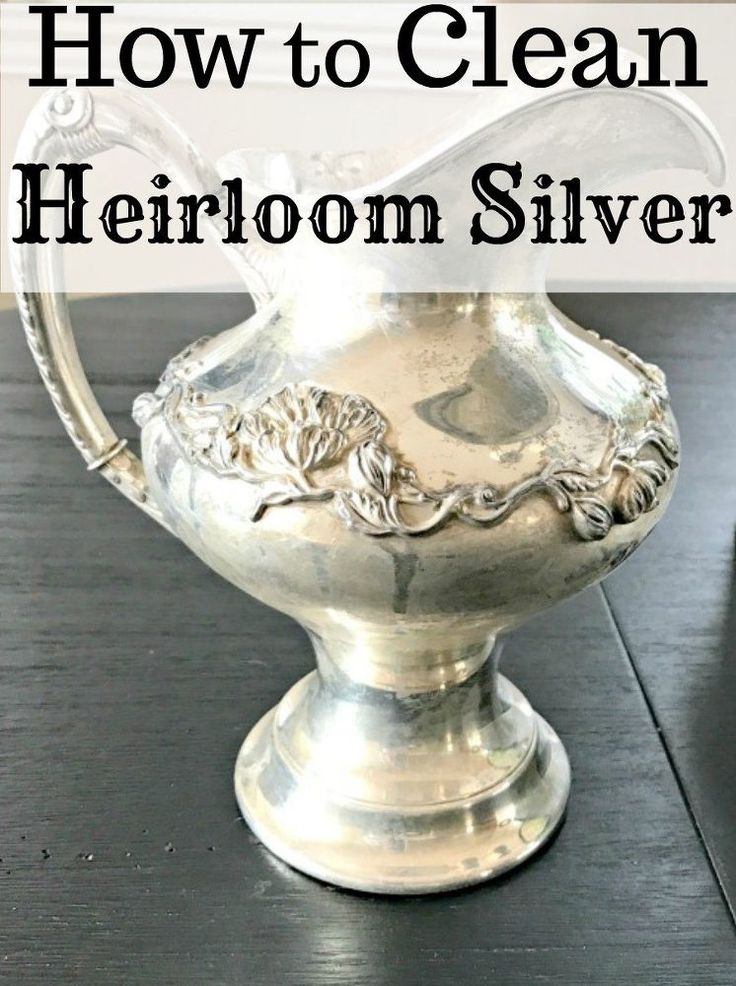 a silver pitcher sitting on top of a table with text overlay that reads how to clean heir silver