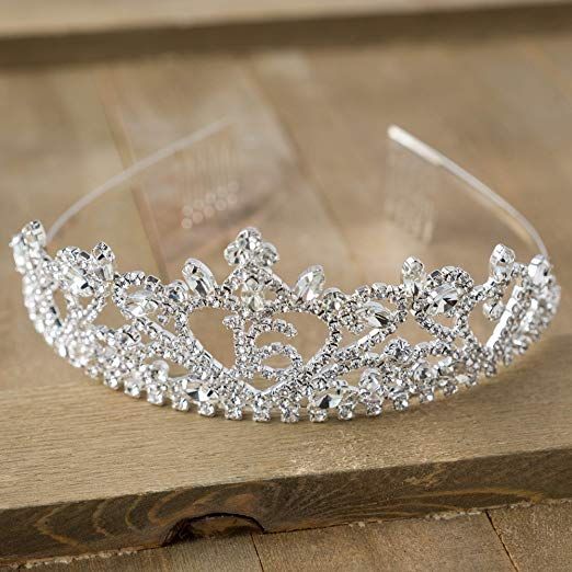 a tiara sitting on top of a wooden table