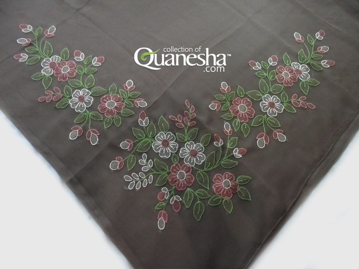 an embroidered bandana with flowers on it is laying on a white tablecloth that says queen of qaanesha com