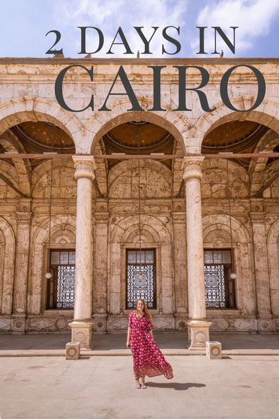 a woman is standing in front of an old building with columns and the words 2 days in cahiro