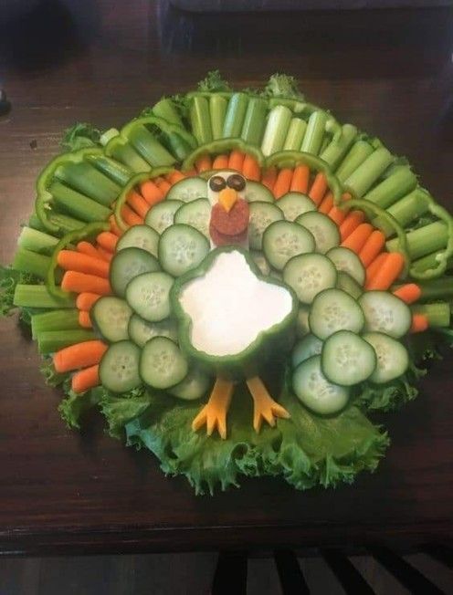 a turkey made out of cucumbers and carrots