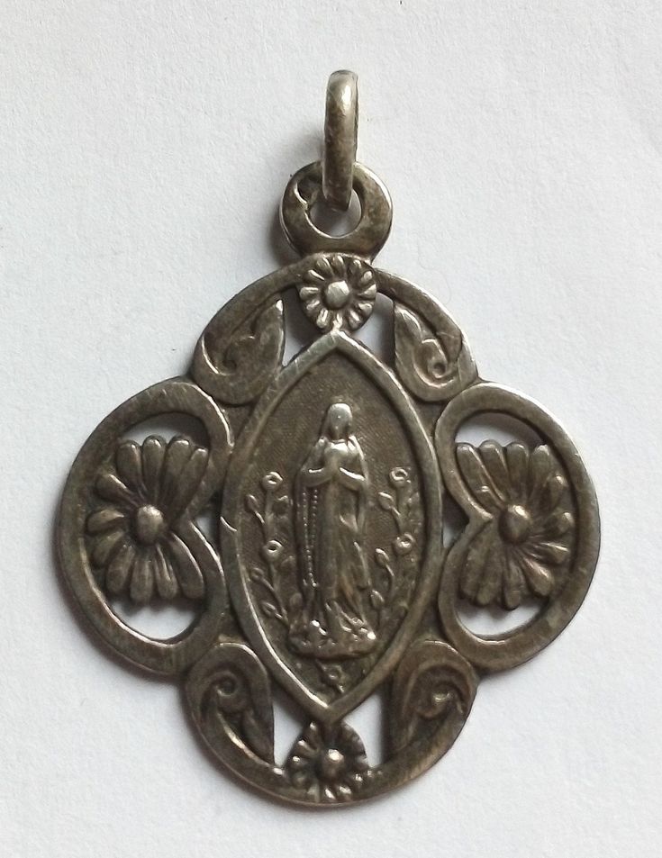 Antique religious medal virgin mary.  it measures 1" without the bail. solid silver. Silver Virgin Mary Pendant Jewelry, Silver Pendant With Miraculous Medal, Silver Miraculous Medal Pendant, Virgin Mary, Coin Collecting, Ships, Electronic Accessories, Paper Party Supplies, Money