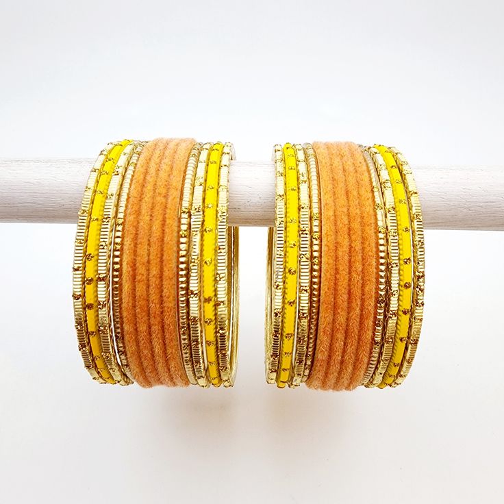 Beautifully designed bangles for any occasion. South asian bracelets come in a variety of styles, colors, and finishes. We at Banglez take creating the perfect bangle set for you to another level! You could say helping you find your favorite stack of bangles as one of our greatest missions. This bangle set was curated in house by one of our talented team members. We hope you love them as much as we do! Coral Bangles, Team Members, Bangle Set, Modern Design, Bangles, Coral, Finding Yourself, Sparkle, Orange