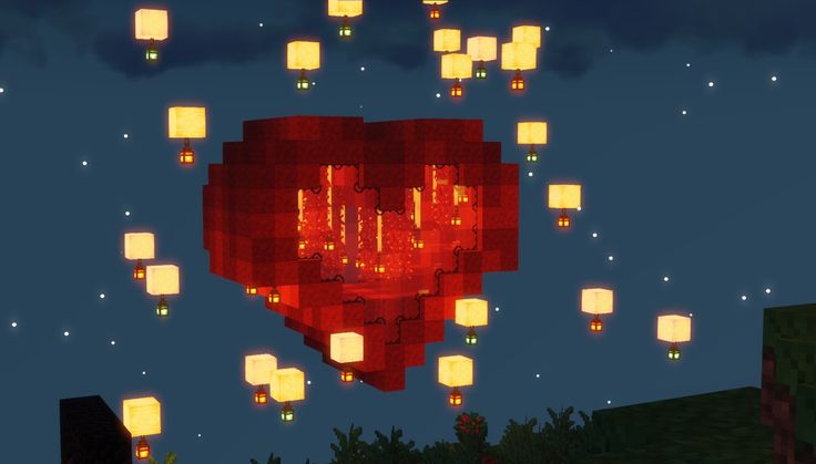 a bunch of lanterns floating in the sky