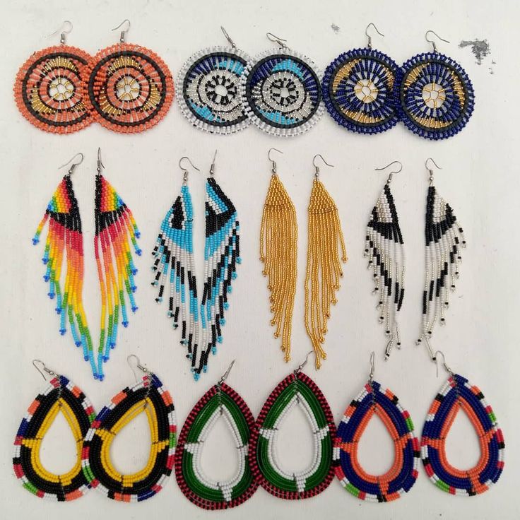 This listings contains a set of 10 beautiful earrings to match with whichever outfit you choose today.  Them are made to precision, giving them their beautiful look.  They are light and therefore comfortable for you.  Try them today 😊 Traditional Beaded Hoop Earrings, Handmade Earrings With Round Beads For Festivals, Handmade Earrings For Festivals, Traditional Adjustable Beaded Earrings With Ear Wire, Colorful Beads Drop Earrings For Festivals, Festival Colorful Bead Drop Earrings, Festival Earrings With Round Beads And Ear Wire, Traditional Beaded Earrings With Round Beads, Festival Beaded Drop Earrings