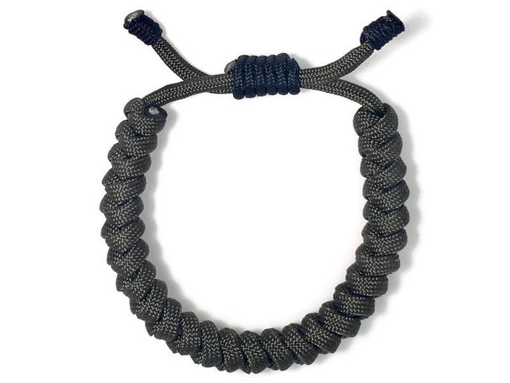 The warrior rope bracelet is a slim and adjustable bracelet in olive drab. It fits in perfectly with any style. Adjustable and fits on most wrists. 100% paracord. Handmade as soon as you order it. Feel free to ask any questions. Usually ships within 1-2 business days. Adjustable Nylon Cord Braided Bracelets For Outdoor, Durable Adjustable Wristband Bracelet, Adjustable Black Braided Bracelet, Casual Outdoor Bracelet, Durable Nylon Cord Bracelets For Outdoor, Adjustable Black Bracelets For Outdoor, Adjustable Black Braided Bracelet For Outdoor, Casual Nylon Cord Bracelets For Outdoor, Outdoor Adjustable Braided Bracelets With Sliding Knot