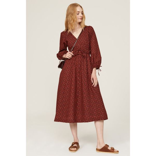 Red crepe (100% Cotton). Hourglass. Long sleeves. V-neck. Tie closure. 47" from shoulder to hemline. Imported. Fall Rayon Midi Dress For Brunch, Red Surplice Neckline Dress For Brunch, Red Maxi Dress For Workwear In Fall, V-neck Viscose Maxi Dress For Work, Red Casual Maxi Dress For Work, Red Midi Dress For Fall Brunch, Casual Red Maxi Dress For Work, Red V-neck Dress For Spring Formal, Elegant Red V-neck Dress For Fall