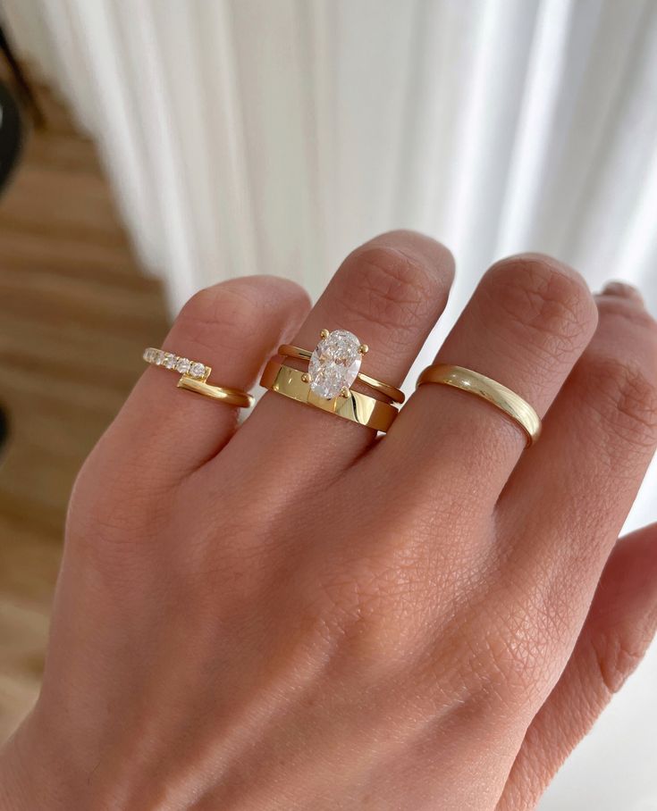 A stunning Oval Solitaire paired with: ⁠ ⁠ 🤍 4mm Classic Flat Band  ⁠ Ring Details:⁠ Emily Oval Solitaire with Tapered Band  1.50ct | E | VVS2 Timeless Engagement Rings Thick Band, Gold Wedding Bands Women Oval Ring, Oval Ring With Thick Band, Tapered Oval Engagement Ring, Solitaire Oval Ring With Wedding Band, Oval Ring With Thick Wedding Band, Oval Engagement Ring Thick Gold Band, Wedding Ring With Thick Band, Wedding Band With Oval Solitaire