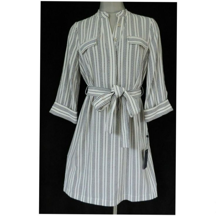 Tommy Hilfiger Women's Striped Belted Shirtdress Front Button Closures Matching Belt Ties At Waist Unlined 96% Polyester, 4% Elastane 8 - Armpit To Armpit 19"; Length 36" From Center Back To Hem 10 - Armpit To Armpit 20"; Length 36.5" From Center Back To Hem 12 - Armpit To Armpit 21"; Length 37" From Center Back To Hem Spring Day Out Dress With Roll-up Sleeves, Casual Office Shirt Dress For Spring, Spring Striped Shirt Dress For Work, Spring Shift Shirt Dress For Work, Spring Button-up Shift Shirt Dress, Spring Office Shirt Dress With Placket, White Shift Shirt Dress For Spring, White Shirt Dress With Button Closure For Office, Fitted Summer Dress With Roll-up Sleeves