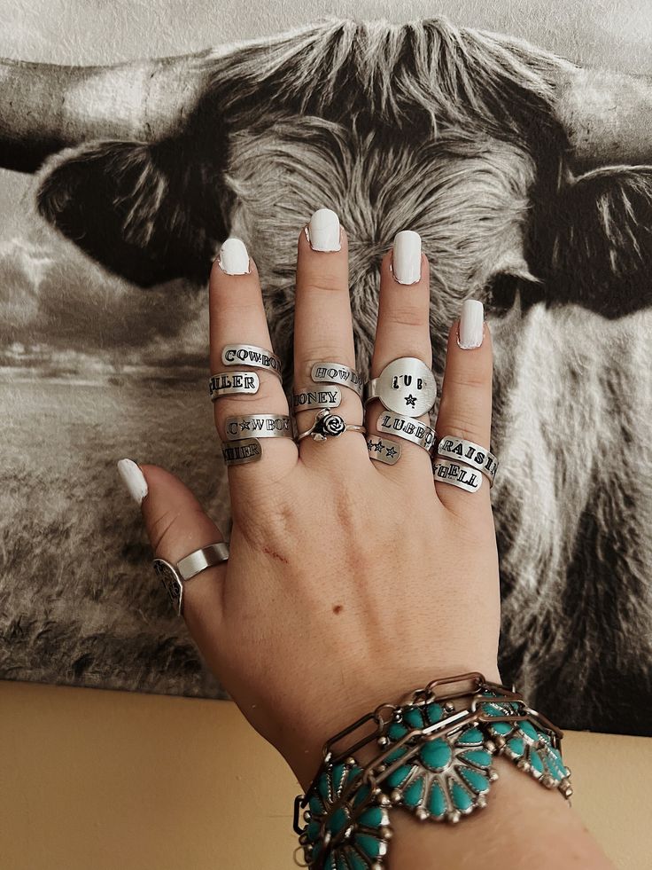 "Hand-stamped western rings ☆made to order ☆adjustable ☆stacker, wrap, and coin style ☆any design can be made in fonts \"outlaw\" or \"sweet and sassy\" ★please message me the font you want your design made in★ ★initals can be added to inside of band for $3★" Cute Western Rings, Western Style Rings, Western Stamped Rings, Western Stamped Jewelry, Metal Stamped Rings, Western Ring, Western Rings, Stamped Ring, Metal Stamped Jewelry