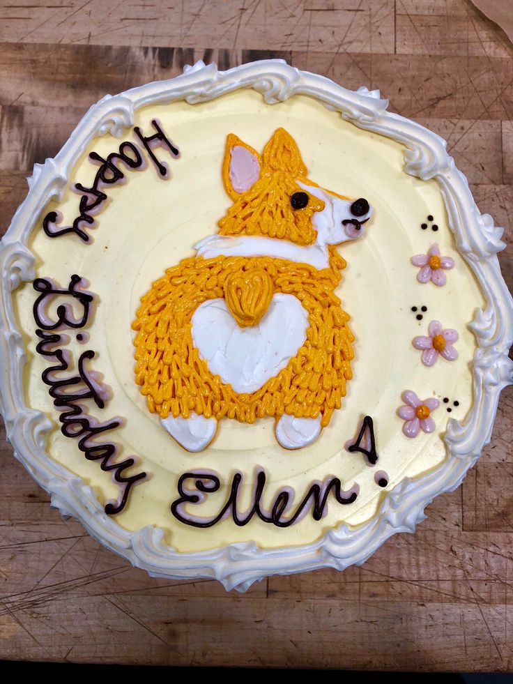 a birthday cake with a dog on it