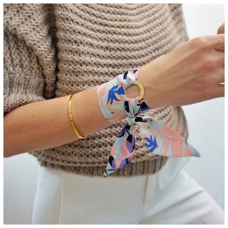 Silk bracelet Anna paired with “Perfectly Imperfect” engraved bangle by Silk Philosophy. Statement accessories suitable for office and everyday wear. Unique gift for her. Multi-functional silk accessory. Wear it as a bracelet, ribbon in your hair, handbag charm or mini scarf or choker; perfect summer accessory #wristscarf #birthdaygift #bracelet #armcandy #ootd #silkscarf #uniquegift #scarfbracelet #bangle #summeraccessories #falloutfits #falloutfitideas #giftideas Luxury Multicolor Silk Scarf For Spring, Chic Pink Satin Silk Scarf, Trendy Silk Scarf For Spring Gift, Designer Multicolor Silk Scarf For Spring, Trendy Satin Scarf For Summer, Trendy Satin Silk Scarf For Summer, Chic Pink Silk Scarf For Formal Occasions, Elegant Blue Silk Scarf For Spring, Trendy Summer Satin Silk Scarf