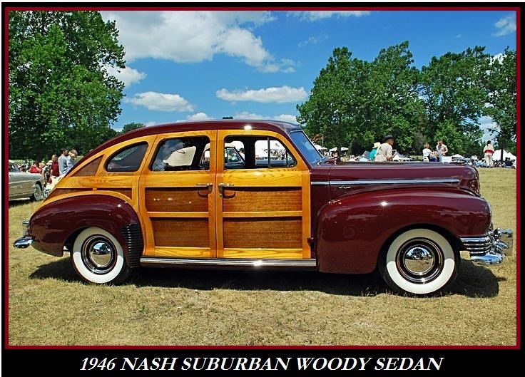 an old fashioned car with wood paneling on the front and side doors, parked in a field