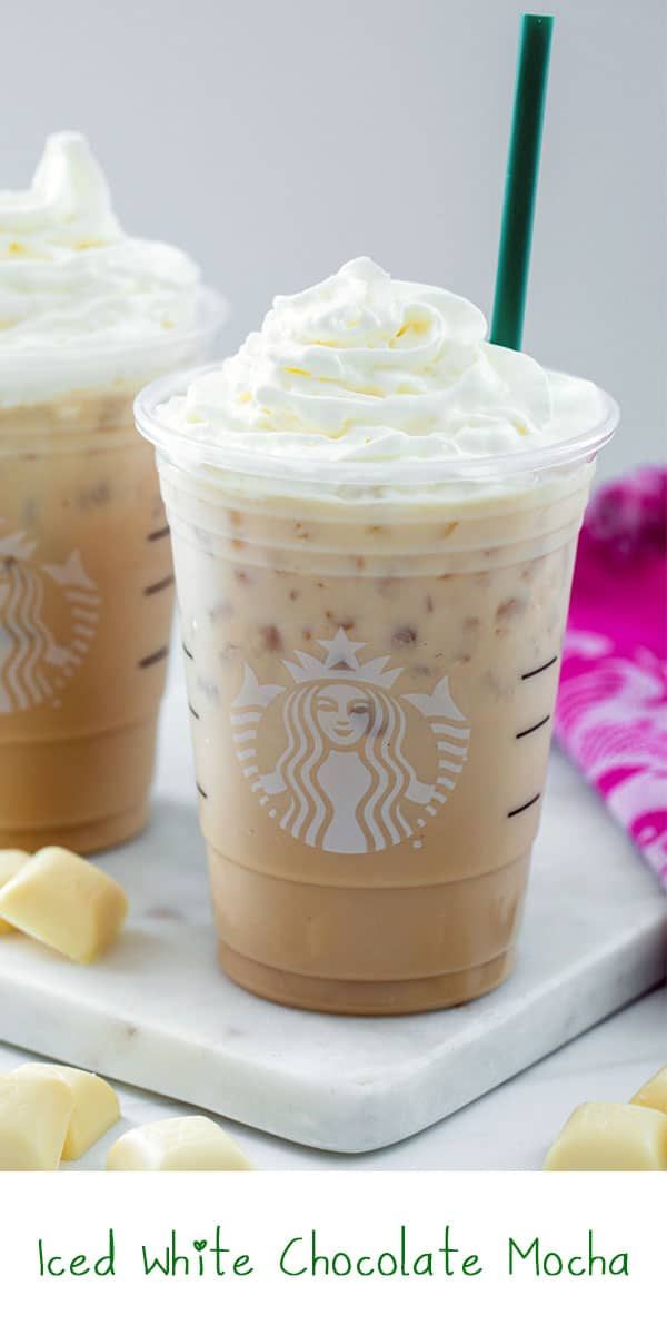 two iced white chocolate mochas with whipped cream on top