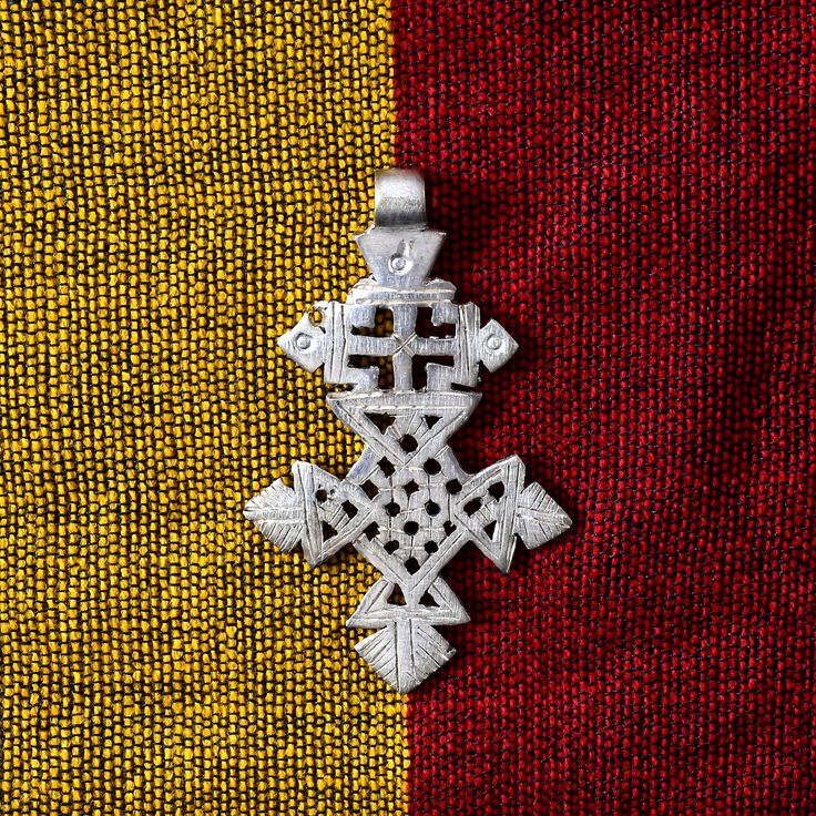 Handmade Ethiopian orthodox church neck cross made of bronze. Uniquely made cross pendent by seasoend Ethiopian artisian using lost wax method of jewelry making and hand engraved to give it a final touch.  The cross measures 75 x 45 mm.(HxW)  Please visit my shop for similar items and buy more and save more on shipping. Ethiopian neck cross orthodox church neck cross pendant African beads handmade Traditional Handmade Cross Necklace, Traditional Handmade Crucifix Necklace, Spiritual Cross Pendant Necklace For Jewelry Making, Traditional Silver Cross Necklace, Handmade Spiritual Cross Pendant Necklace, Handmade Artisan Cross Pendant Necklace, Cross Pendent, Coptic Cross, Cross Beads