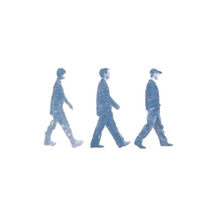 four people walking in the same direction