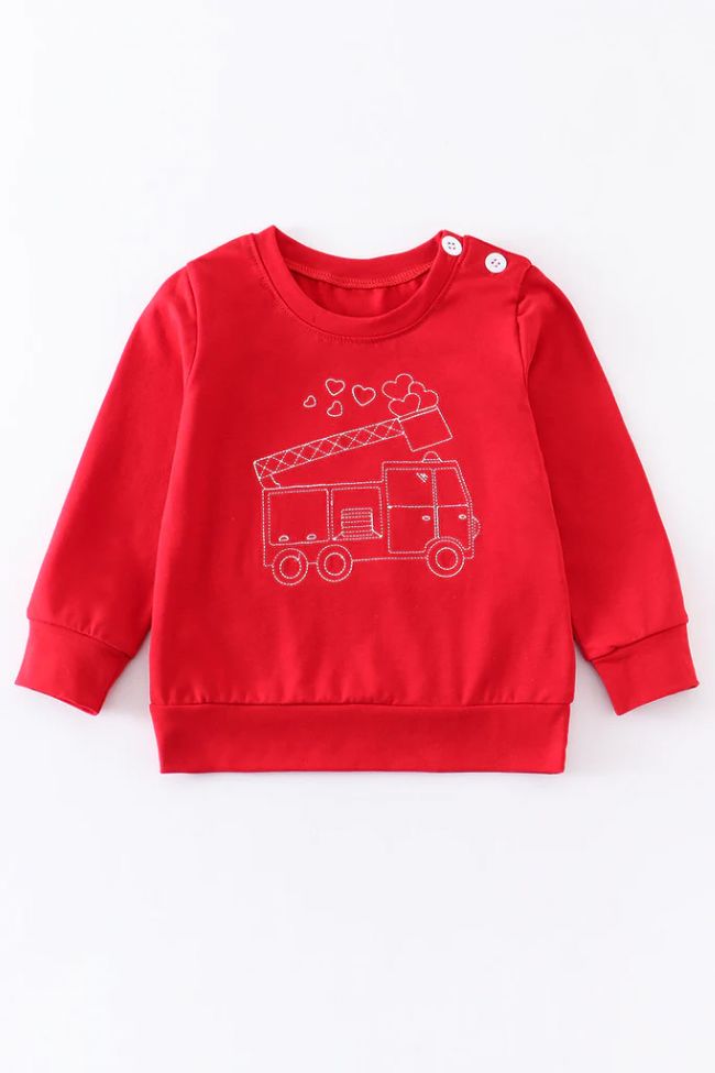 This fire truck embroidery boy top will make your little one look adorable. Featuring bold red color and convenient buttons on the sleeve, this shirt is a perfect addition to your child's wardrobe. Easy to wear, comfortable, and stylish - it's a must-have! 95%Cotton / 5% Spandex Red Long Sleeve T-shirt With Cartoon Print, Red Long-sleeve T-shirt With Cartoon Print, Red Crew Neck Top For Playtime, Red Tops For Fall Playtime, Carolina Gamecocks Outfits, Truck Embroidery, Truck Top, Smocked Bishop Dress, Sibling Outfits