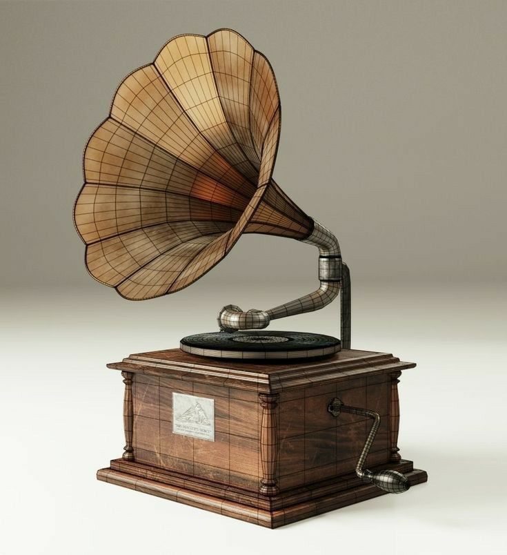 an old phonograph sitting on top of a wooden box