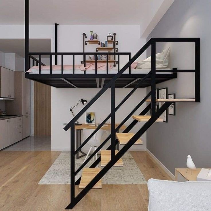 there is a loft bed in the middle of this living room with stairs leading up to it