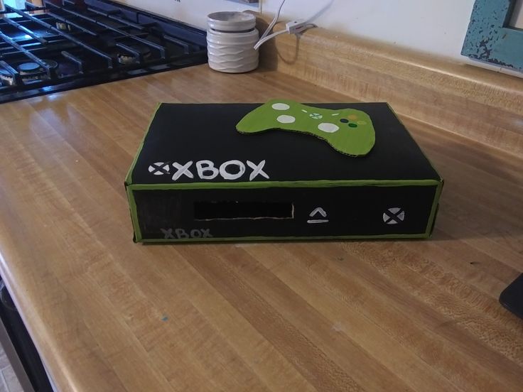 a xbox box sitting on top of a wooden table