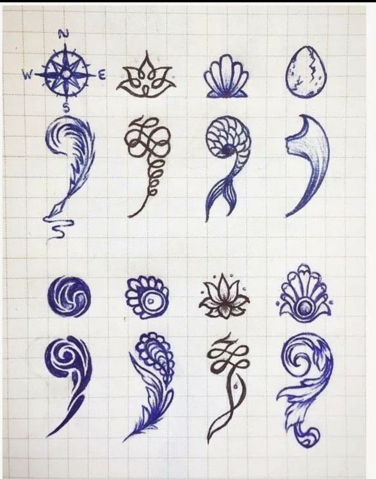 some blue and white designs on a sheet of paper