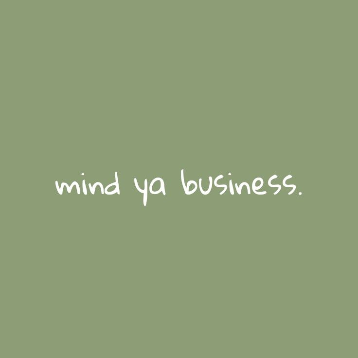 the words mind ya business written in white on a green background