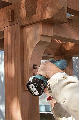 a man using a power drill on a piece of wood