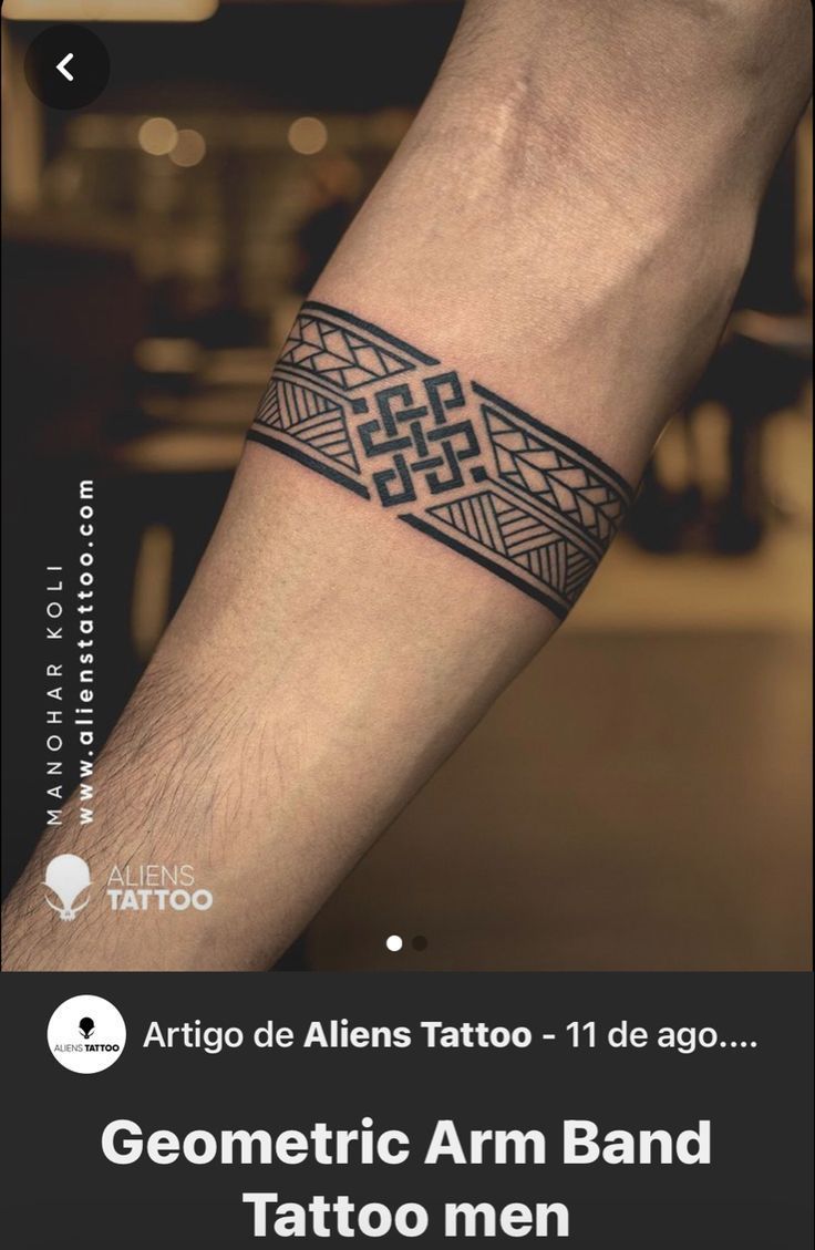 an arm tattoo with geometric designs on it and the words, tattoos are written in black ink