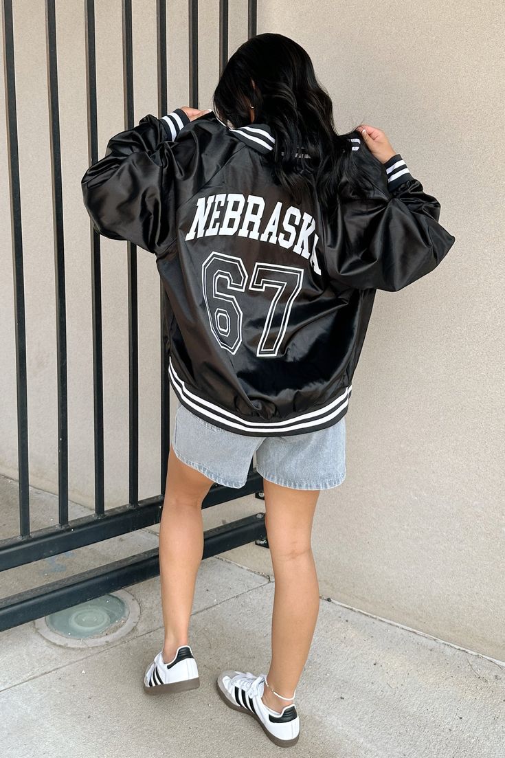 Get ready for game day with this new FSB exclusive- the Nebraska 1867 Varsity Jacket! Available in small-xl Model is wearing size XL Team-colored Outerwear With Team Name For Game Day, Sporty Winter Outerwear For Game Day, Collegiate Outerwear With Team Name For Game Day, Team-colored Outerwear With Team Name For Sports Season, Team Outerwear For Game Day, Game Day Long Sleeve Varsity Jacket With Team Name, Game Day Varsity Jacket With Team Name, Varsity Jacket With Team Name For Game Day, Team-colored Outerwear For Game Day With Team Spirit