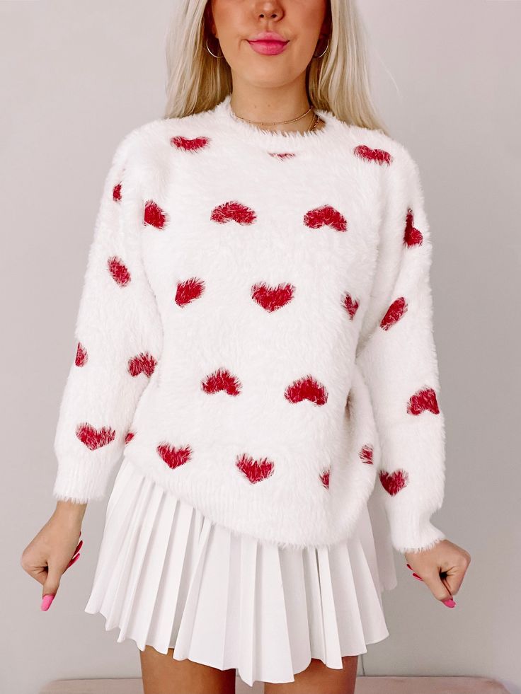 Loving Life Heart Sweater | Sassy Shortcake | sassyshortcake.com White Heart Sweater For Winter, White Heart Print Sweater For Winter, White Heart-shaped Sweater For Spring, White Long Sleeve Sweater For Valentine's Day, Trendy White Sweater With Heart Print, White Trendy Sweater With Heart Print, White Casual Sweater With Heart Print, White Sweater For Valentine's Day, Casual White Sweater With Heart Print