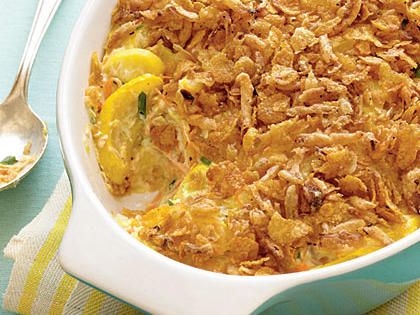 a casserole dish with lemons and bread crumbs